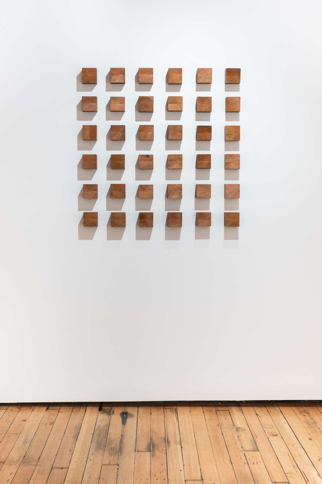 a grid of redwood blocks