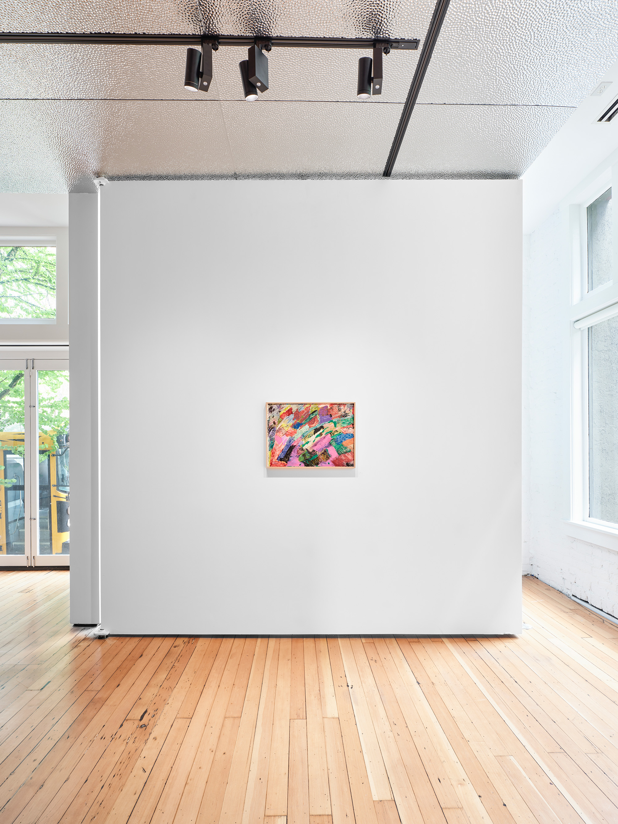 A rectangle swirl of purple marker and the a lopsided name "Tess" sits squarely in a white canvas