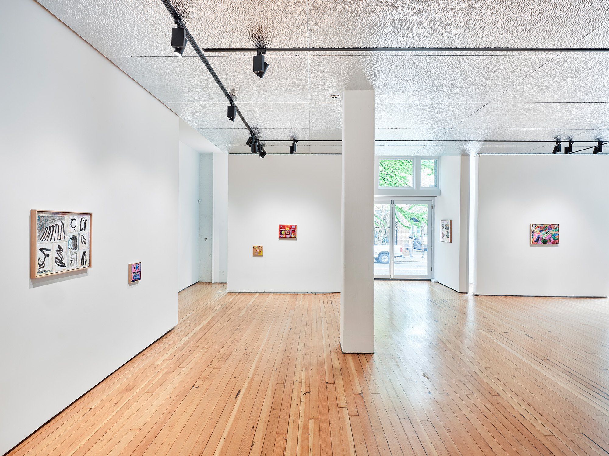A rectangle swirl of purple marker and the a lopsided name "Tess" sits squarely in a white canvas